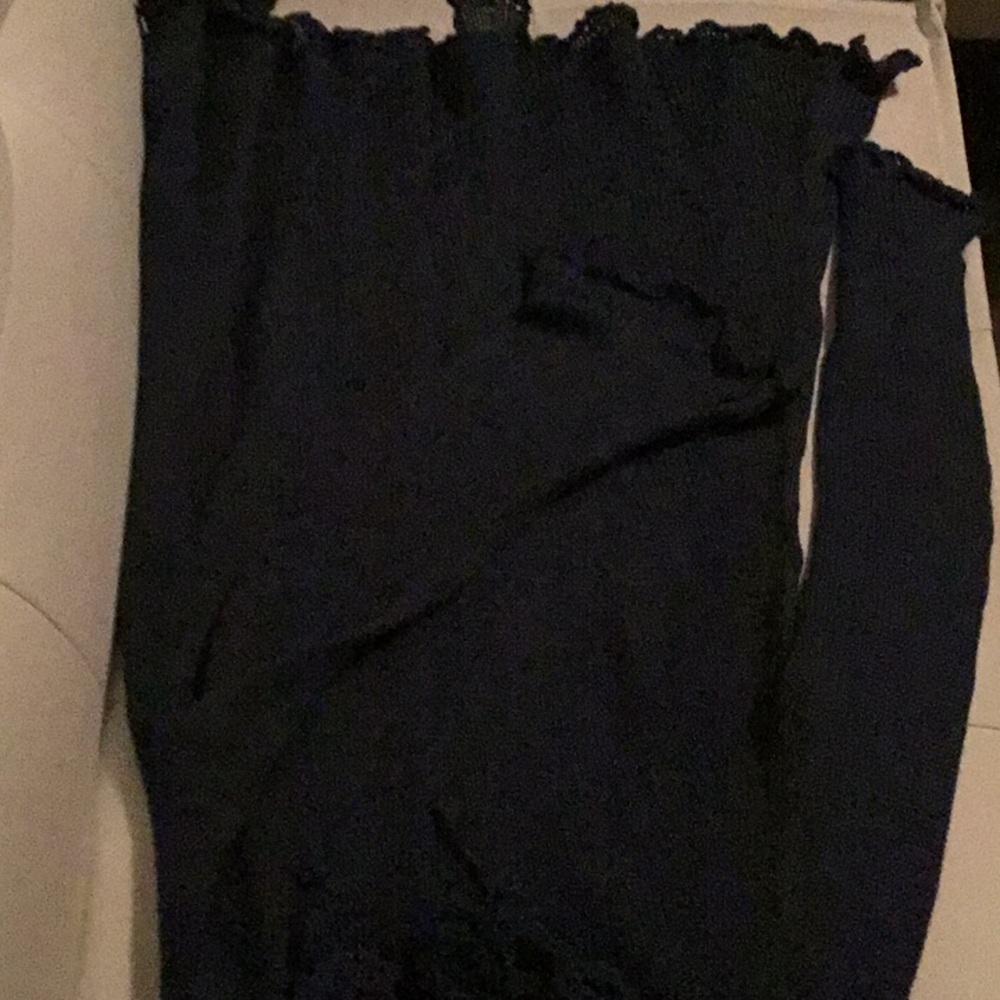 Knitted sweater, flower buds around the front